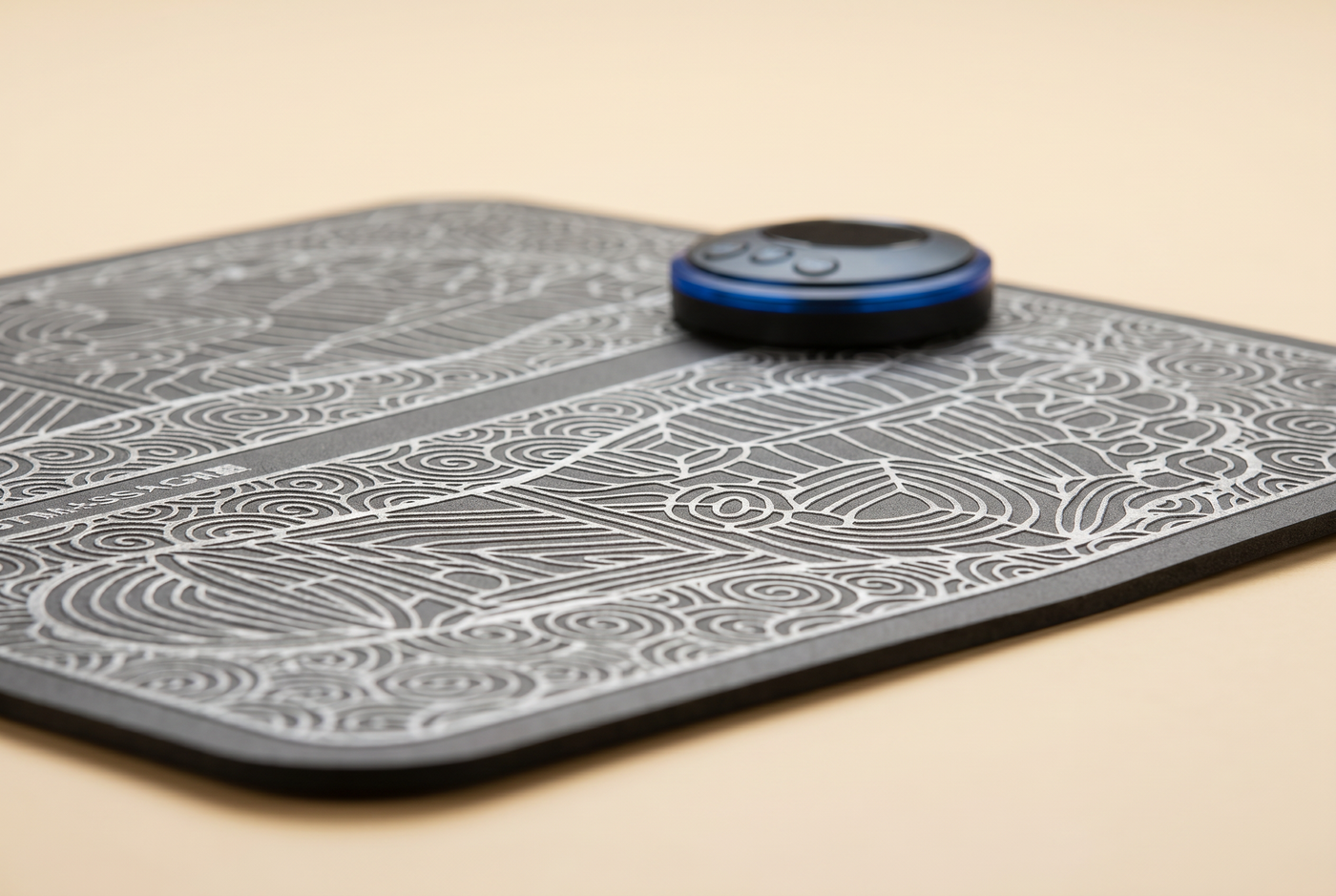Close-up of the FootEase mat texture and foot-shaped massage zones